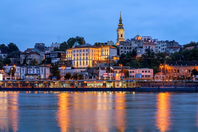 Panorama of Belgrade at night with river Sava